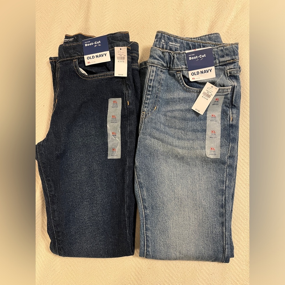 Old Navy girls mid-rise boot cut jeans in medium and dark denim